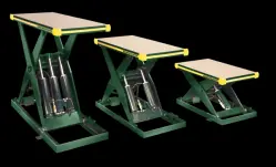 Three different sized backsaver lift tables lined up next to each other